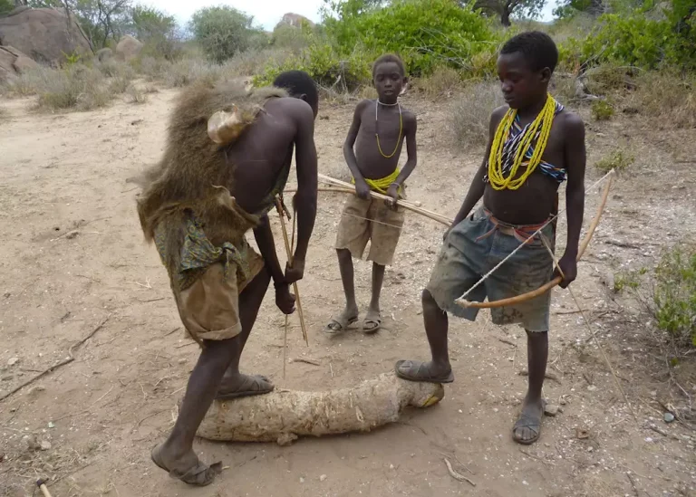 454894-young-hadzabe-boys-practice-their-shooting-skills-lake-eyasi-tanzania